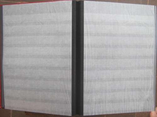 EMPTY STOCKBOOK (RED, PADDED AND WITH 60 x BLACK PAGES) - VERY GOOD CONDITION