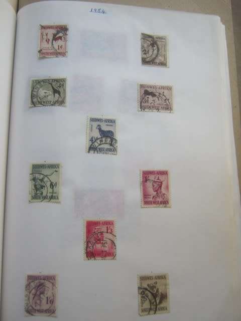 SPRINGBACK TYPE STAMP ALBUM - MIXED WORLD - STRONG ON SOUTHERN AFRICA BUT NO UNION/RSA