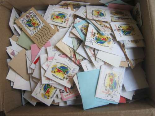 **R1 START** BISCUIT BOX ABOUT 90% FULL OF 1995 MASAKHANE STAMPS ON PAPER
