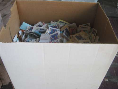 **R1 START** PAPER BOX ABOUT 60% FULL OF1995 UNITED NATIONS STAMPS ON PAPER