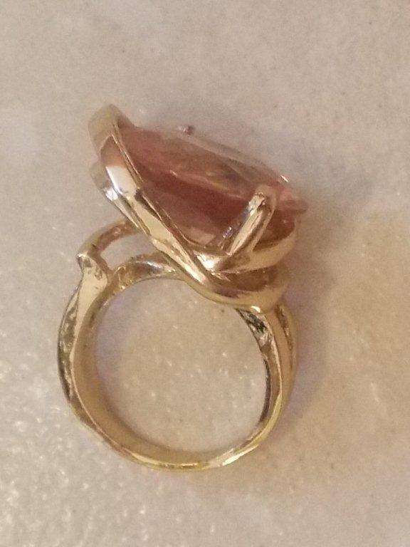 INTERNATIONAL IMPORT GOLD FUSION RING WITH HUGE SIM GEMSTONE ADDED IN A STUNNING SETTING SIZE 6