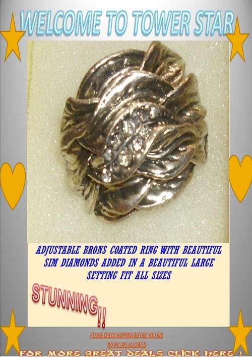 ADJUSTABLE BRONS COATED RING WITH STUNNING SIM DIAMONDS ADDED IN A LARGE SETTING
