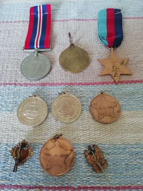 BIG LOT OF MEDALS AND INSIGNIA 2XFULL MEDALS ISSUED TO JJ BEKKER