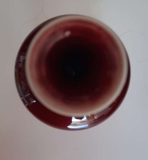 A Chinese red-glazed `sang de boeuf` vase