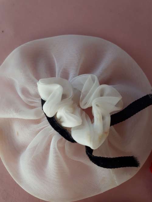 Acc to various Barbie outfits from '59-'62