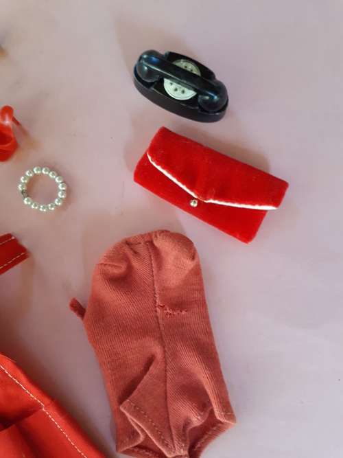 Acc to various Barbie outfits from '59-'62