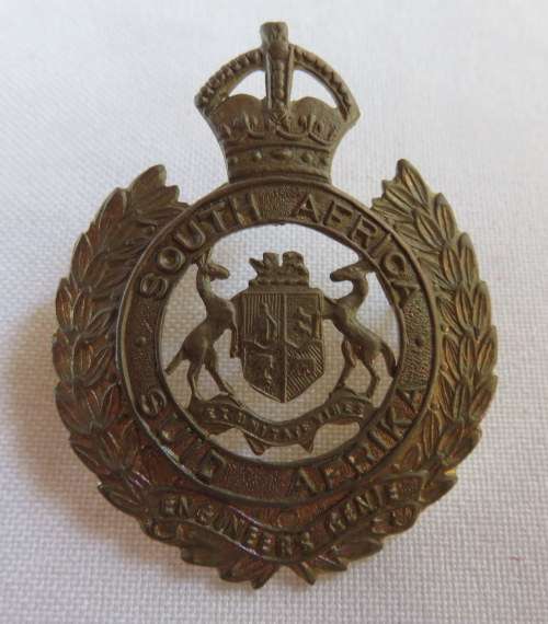 SA ENGINEERS CORPS,BRASS CAP BADGE WORN DURING WW2-2 LUGS