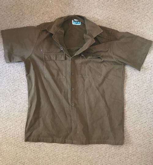 NUTRIA SADF SHORT SLEEVE SHIRT LABELLED  DATED 1989-SIZE XL-MEASURES 65CM ARMPIT TO ARMPIT-GOOD COND