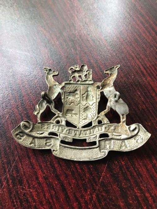 SA RAILWAYS ,WHITE METAL CAP BADGE-2 LUGS