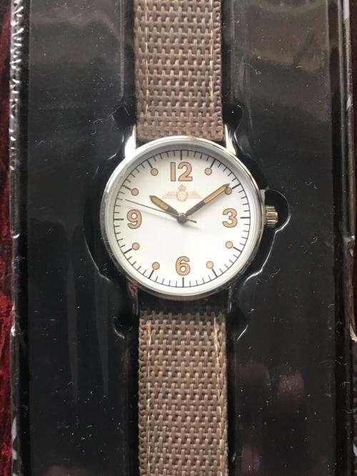 REPLICA OF THE CANADIAN PILOTS WATCH ROYAL CANADIAN AIR FORCE-1940'S WITH 15 PAGE BOOKLET ON THE HIS