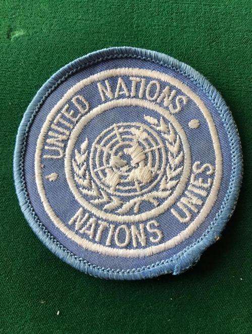 UNITED NATIONS EMBROIDERED CAP BADGE