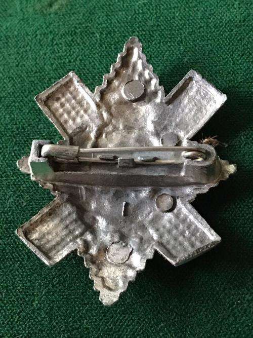 BLACK WATCH CAP BADGE-WORN FROM 1960'S