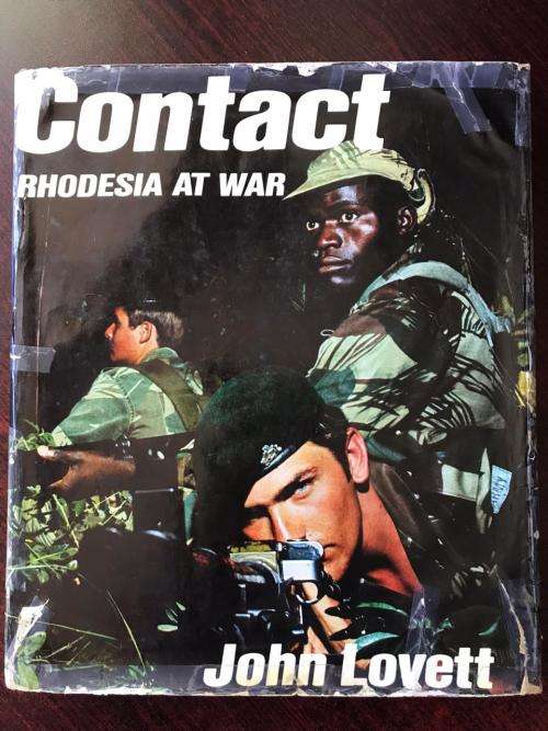 CONTACT-RHODESIA AT WAR BY JOHN LOVETT-FIRST EDITION PUBLISHED 1977-239 PAGES-CONDITION GOOD CONSIDE