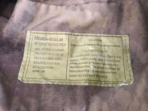 US JUNGLE HAT IN MULTICAM,CAME INTO BEING DURING THE VIETNAM WAR-IT HAS SEEN MODIFICATIONS AND IS US