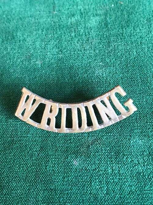 DUKE OF WELLINGTON.S REGT. TITLE-WORN PRE 1915- 2 LUGS