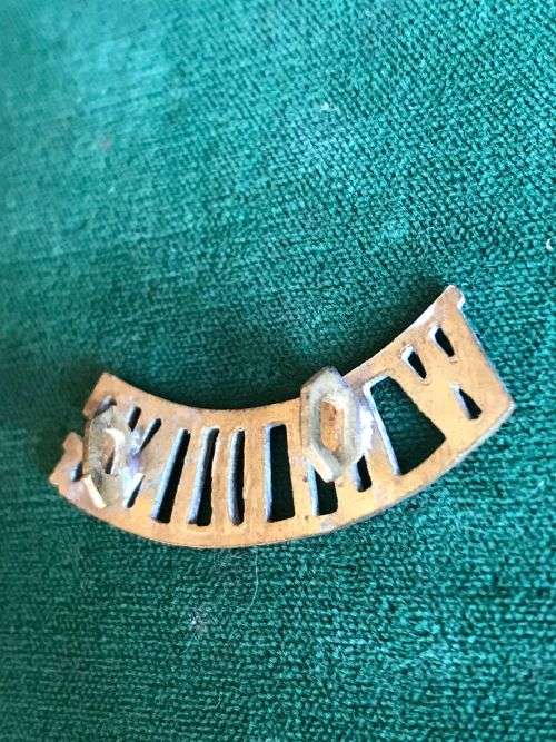 DUKE OF WELLINGTON.S REGT. TITLE-WORN PRE 1915- 2 LUGS