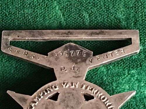 FULL SIZE POLICE MEDAL FOR COMBATING TERRORISM-AWARDED TO SERS. P.J. VENTER 59577E- NO RIBBON