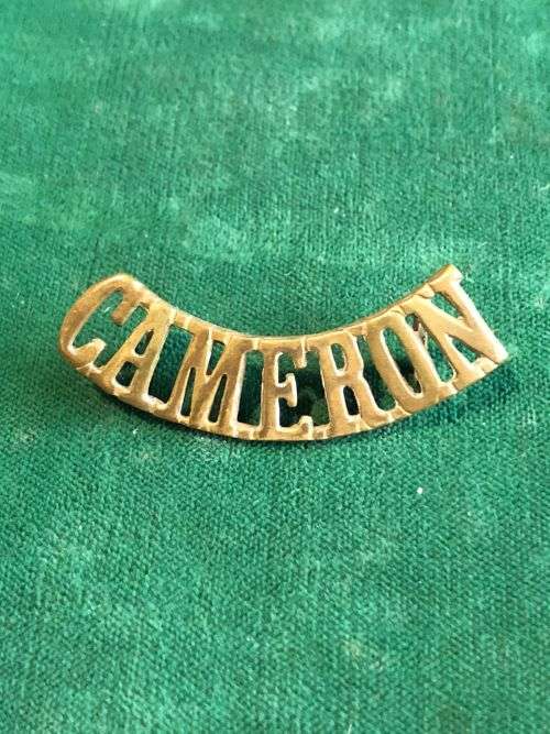 THE QUEENS OWN CAMERON HIGHLANDERS TITLE- WORN PRE 1924- 2 LUGS