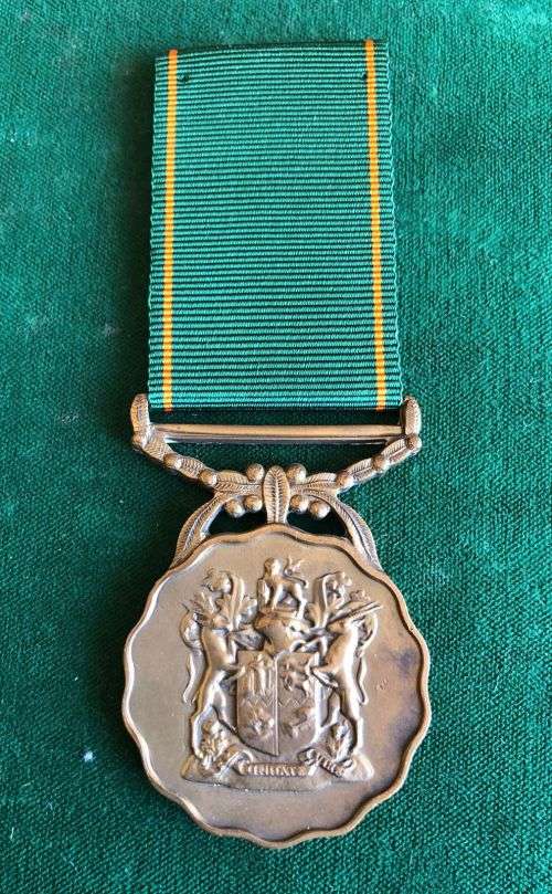 FULL SIZE GOOD SERVICE MEDAL IN BRONZE-COMMANDO 1975-1986- 10 YEARS-NUMBERED