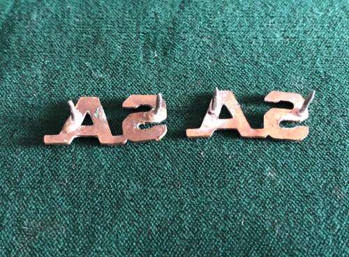 SA BRASS COLLAR TITLES-SOLD IN PAIRS-PINS + LUGS INTACT