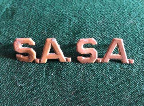 SA BRASS COLLAR TITLES-SOLD IN PAIRS-PINS + LUGS INTACT