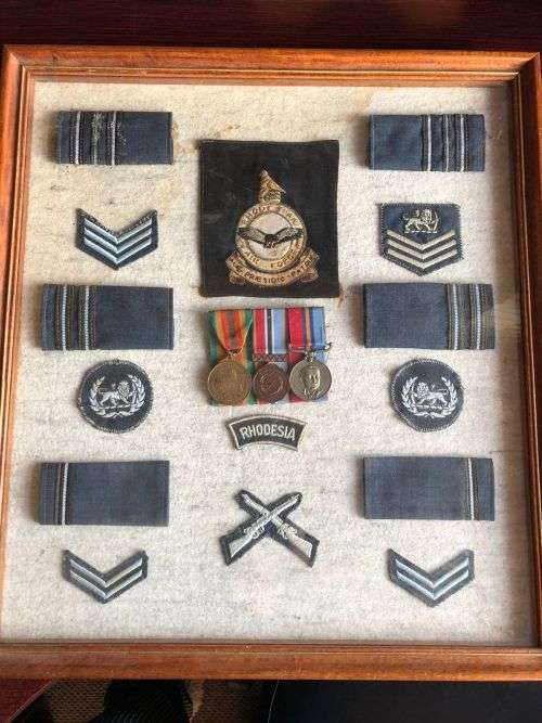 RHODESIA COLLECTION OF MEDALS AND BADGES WITH COMMENDATIONS-JOHN FRANK KLEYNHANS WAS A WARRANT OFFIC