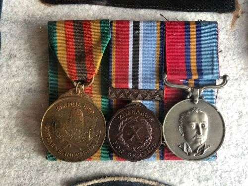 RHODESIA COLLECTION OF MEDALS AND BADGES WITH COMMENDATIONS-JOHN FRANK KLEYNHANS WAS A WARRANT OFFIC