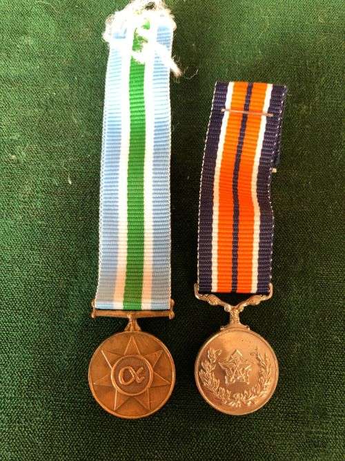 Miniature Unitas and GSM sold together