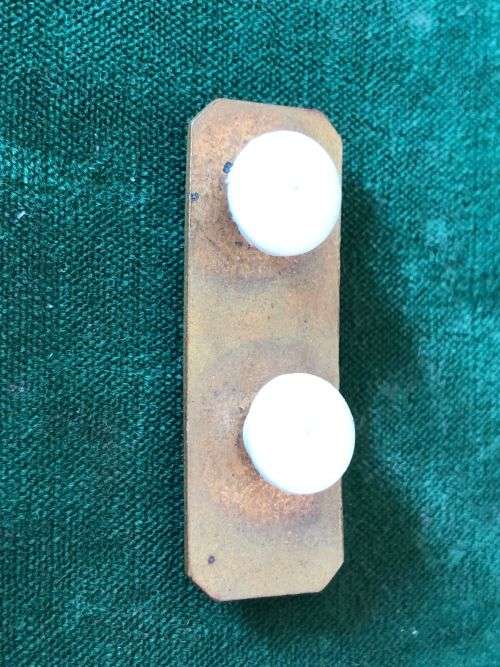 SA ARMY MARKSMAN BADGE-BLACKENED BRONZE RIFLE ON RED ENAMEL BACKING-2 PIECE- 2 PINS