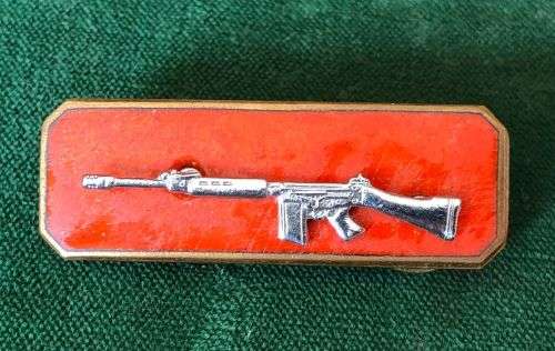 SA ARMY SHARPSHOOTERS QUALIFICATION BADGE CHROMED RIFLE ON RED ENAMEL BACKING-2 PIECE- 2 PINS
