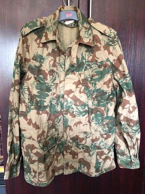 POLICE TASK FORCE CAMO JACKET SIZE MEDIU TO LARGE- MEASURES 60CM ARMPIT TO ARMPIT-2ND PATTERN CAMO-V