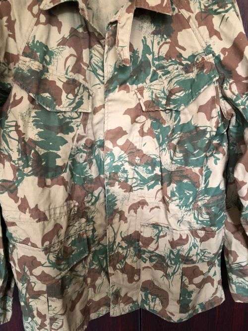 POLICE TASK FORCE CAMO JACKET SIZE MEDIU TO LARGE- MEASURES 60CM ARMPIT TO ARMPIT-2ND PATTERN CAMO-V
