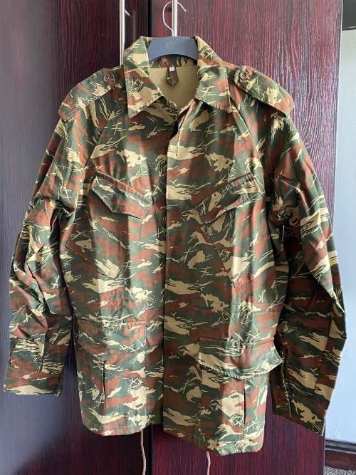 KOEVOET CAMO JACKET,SIZE LARGE, MEASURES 65CM ARMPIT TO ARMPIT-NEVER BEEN WORN-AS NEW CONDITION-SMAL