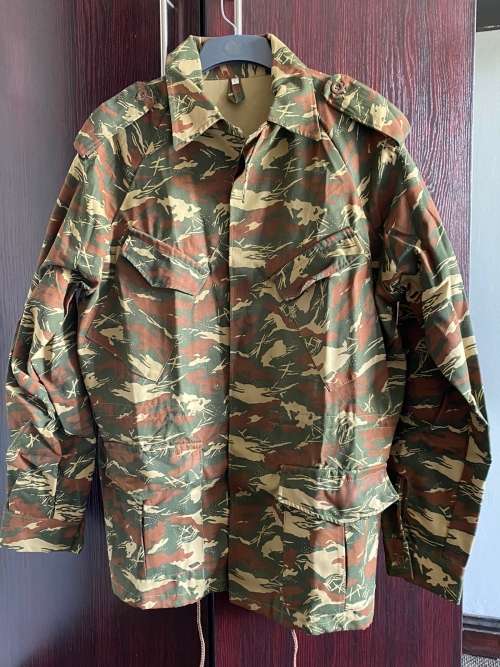 KOEVOET CAMO JACKET,SIZE LARGE, MEASURES 65CM ARMPIT TO ARMPIT-NEVER BEEN WORN-AS NEW CONDITION-SMAL