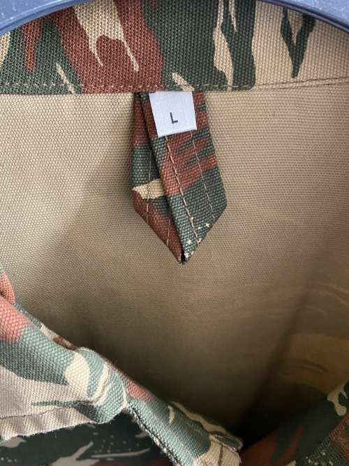 KOEVOET CAMO JACKET,SIZE LARGE, MEASURES 65CM ARMPIT TO ARMPIT-NEVER BEEN WORN-AS NEW CONDITION-SMAL