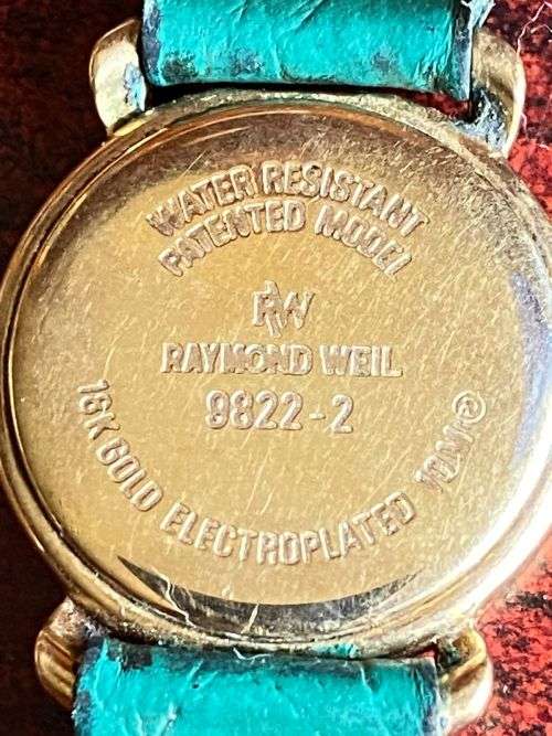 RAYMOND WEIL LADIES WATCH-18 CT GOLD-ELECTROPLATED-DIAMETER ON THIS WATCH IS 14 MM