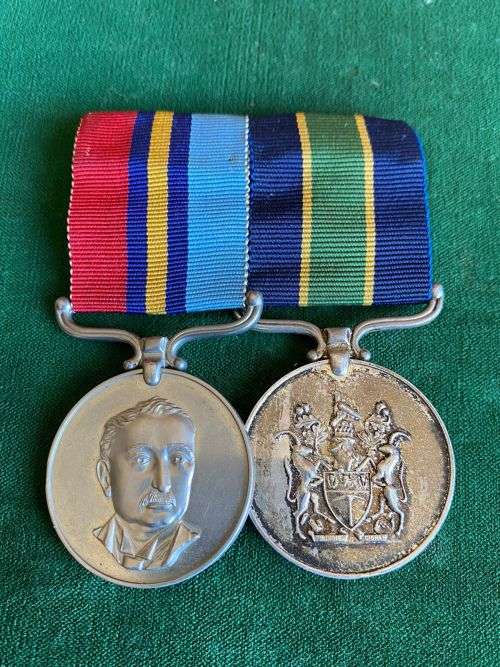 RHODEESIA FULL SIZE PAIR OF MEDALS -THE GSM NAMED TO 14070 D/CONST MUGAURI-THE POLICE LONG SERVICE M