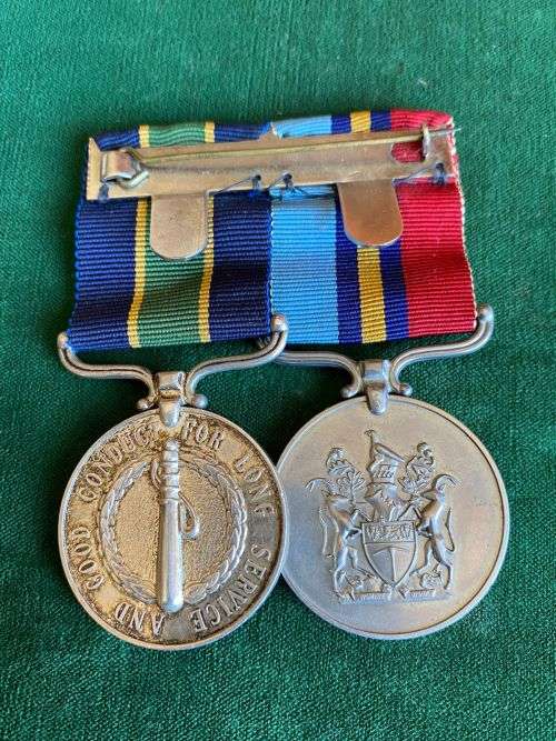 RHODEESIA FULL SIZE PAIR OF MEDALS -THE GSM NAMED TO 14070 D/CONST MUGAURI-THE POLICE LONG SERVICE M