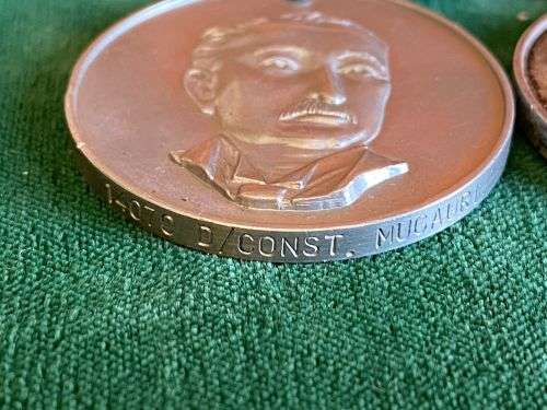 RHODEESIA FULL SIZE PAIR OF MEDALS -THE GSM NAMED TO 14070 D/CONST MUGAURI-THE POLICE LONG SERVICE M