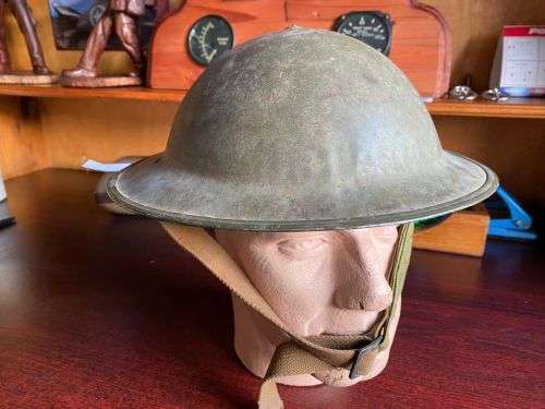 WW2 SA MADE `BRODIE HELMET` COMES WITH LINER AND CHIN STRAP
