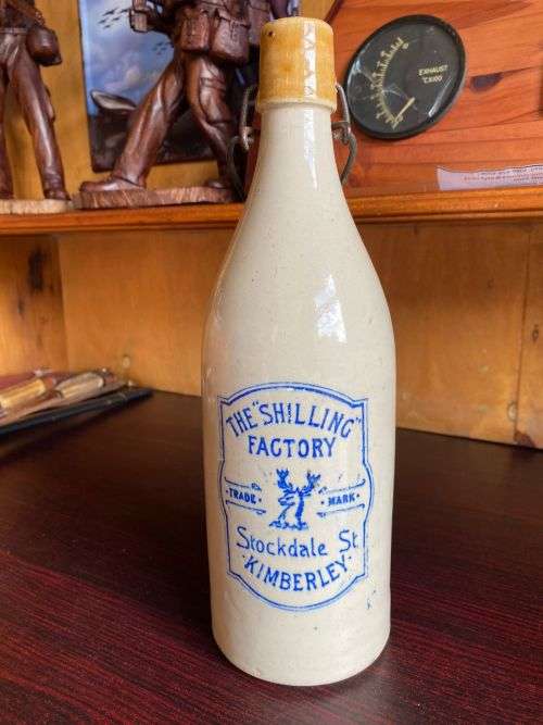 SHILLING FACTORY,THE 48 STOCKDALE STR KIMBERLEY-GINGER BEER BOTTLE-HEIGHT 27 CM