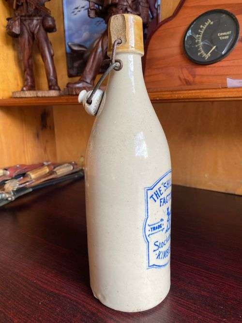 SHILLING FACTORY,THE 48 STOCKDALE STR KIMBERLEY-GINGER BEER BOTTLE-HEIGHT 27 CM