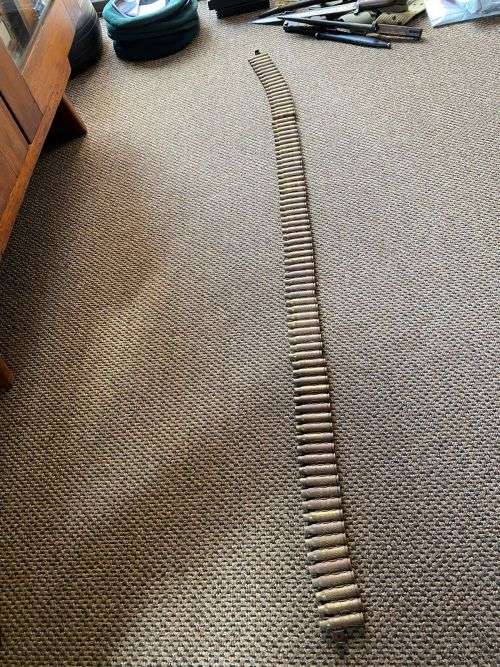 96 FFE SHELLS ATTACHED IN THEIR ORIGINAL BELT,AS USED BY LMG IN THE BUSH WAR-TOTAL LENGTH 125 CM, 7,