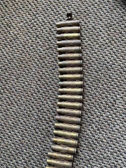 96 FFE SHELLS ATTACHED IN THEIR ORIGINAL BELT,AS USED BY LMG IN THE BUSH WAR-TOTAL LENGTH 125 CM, 7,
