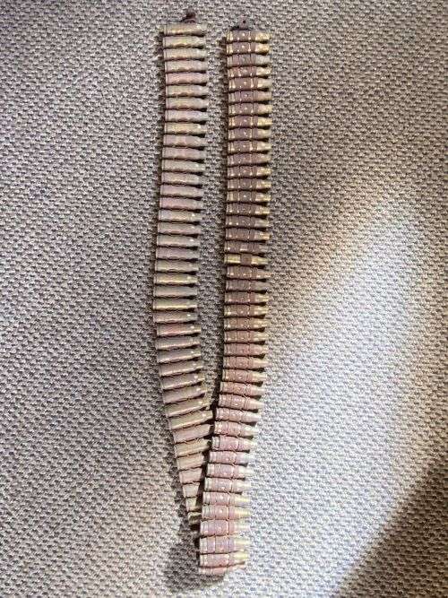 96 FFE SHELLS ATTACHED IN THEIR ORIGINAL BELT,AS USED BY LMG IN THE BUSH WAR-TOTAL LENGTH 125 CM, 7,