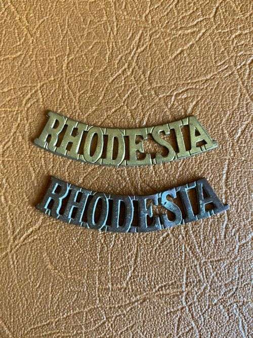 RHODESIA BRASS TITLE PAIR-WORN WW2 TO MID 1950`S- NO LUGS