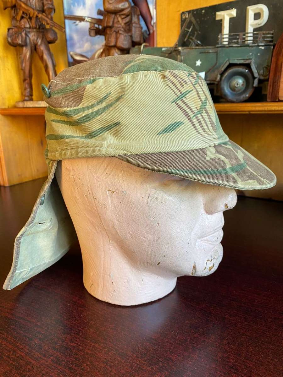 RHODESIAN CAMO FLAP CAP-USED BUT GOOD CONDITION-INSIDE RING-MEASURES 57 CM