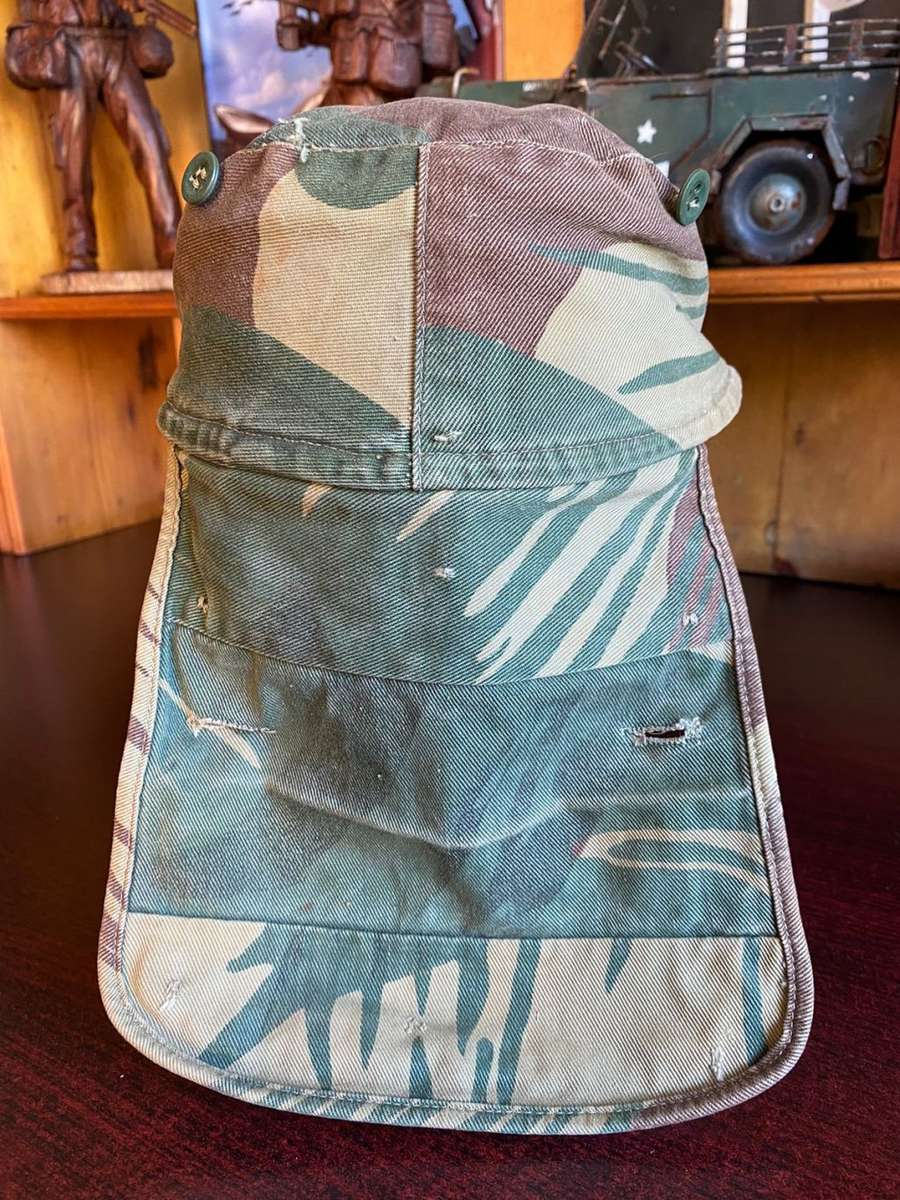 RHODESIAN CAMO FLAP CAP-USED BUT GOOD CONDITION-INSIDE RING-MEASURES 57 CM