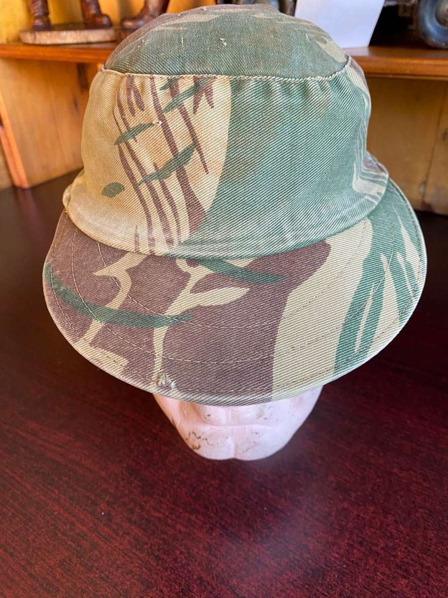 RHODESIAN CAMO FLAP CAP-USED BUT GOOD CONDITION-INSIDE RING-MEASURES 57 CM