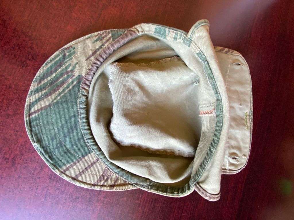 RHODESIAN CAMO FLAP CAP-USED BUT GOOD CONDITION-INSIDE RING-MEASURES 57 CM